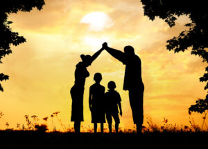 Child Custody Lawyer Brandon, FL - Silhouette, group of happy children playing on meadow, sunset, s